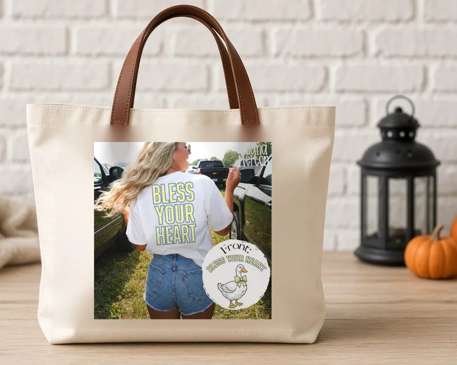 Bless Your Heart Goose PNG design on a canvas tote bag