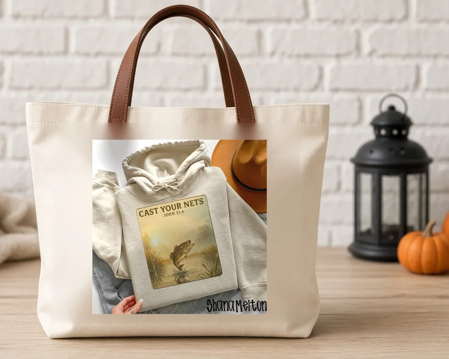 Cast Your Nets PNG design on a canvas tote bag