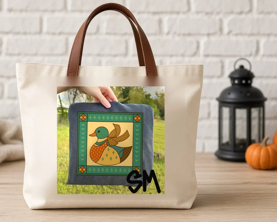 Cross Stitch Mallard PNG design on a canvas tote bag