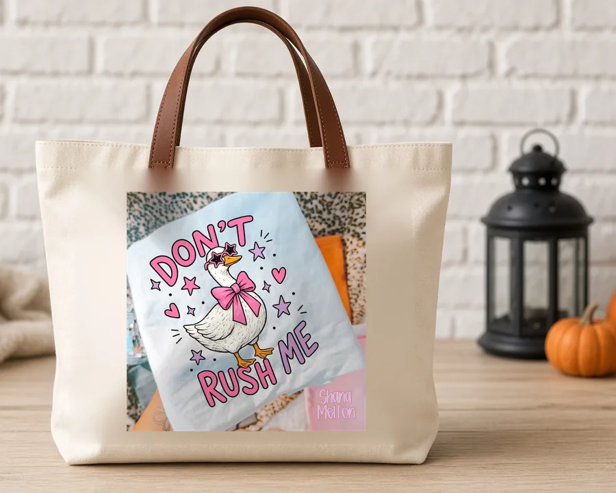 Dont Rush Me Goose PNG design on a canvas tote bag