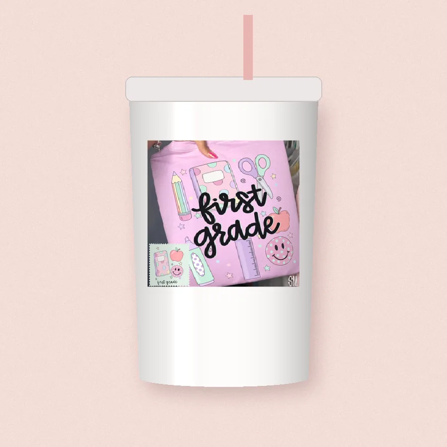 First Grade Teacher Doodles sublimation design on a skinny tumbler