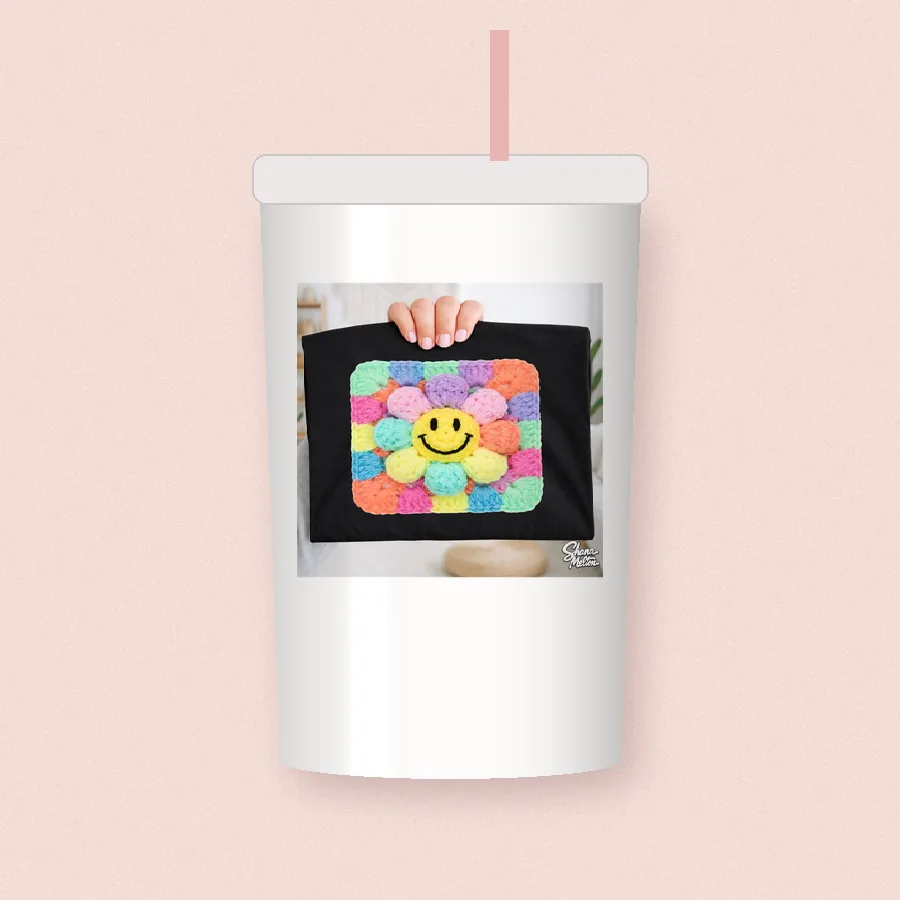 Granny Square Daisy Smiley sublimation design on a skinny tumbler