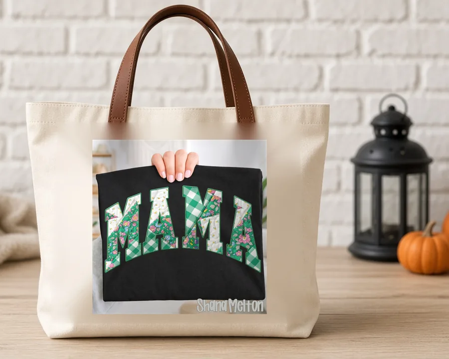 Heirloom Varsity Mama PNG design on a canvas tote bag