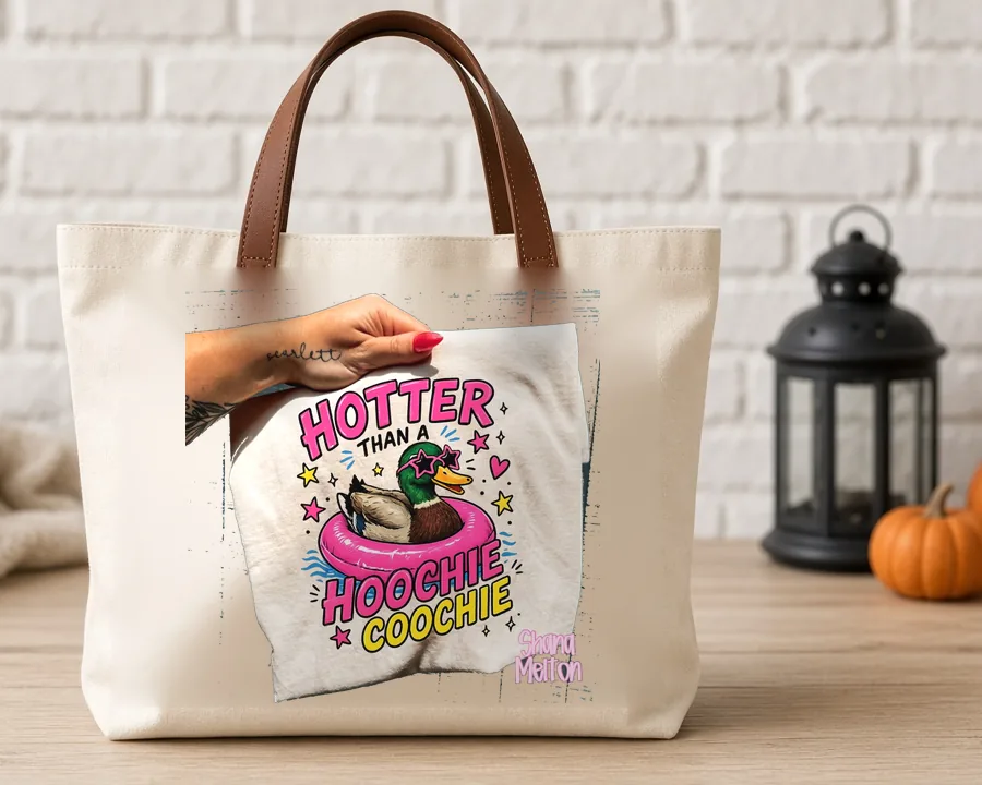 Hotter Than a Hoochie Coochie design on a cotton tote bag