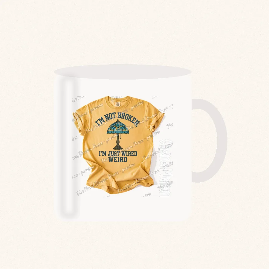 Im Not Broken Just Wired Weird design on a 11 oz mug