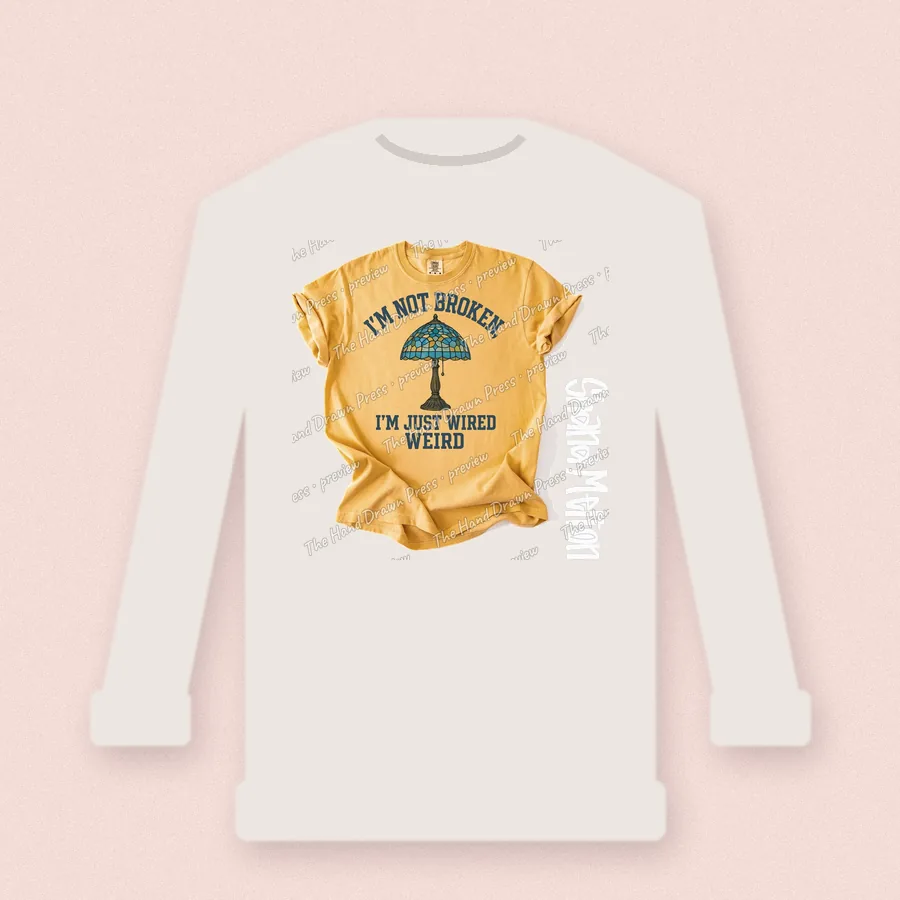 Im Not Broken Just Wired Weird design on a crewneck sweatshirt