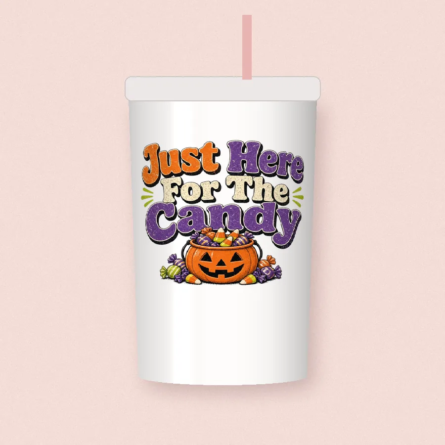 Just Here for the Candy sublimation design on a skinny tumbler
