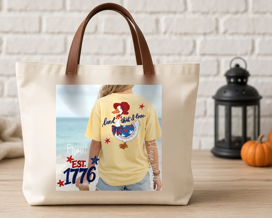 Land of the Free Est 1776 PNG design on a canvas tote bag