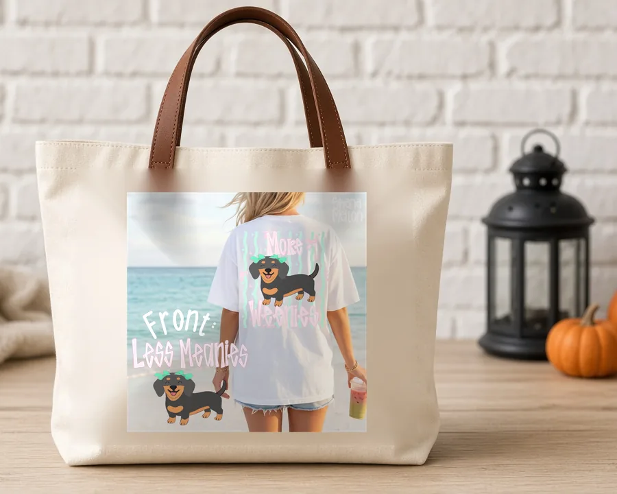 Less Meanies Dachshund PNG design on a canvas tote bag