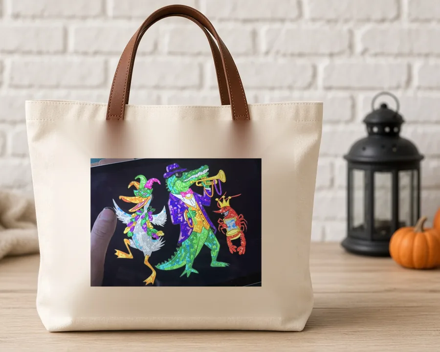 Mardi Gras Sequin Gator Band PNG design on a canvas tote bag