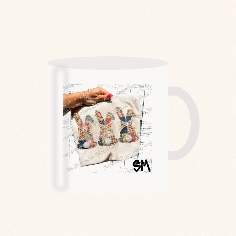 Patchwork Bunnies design on a 11 oz mug