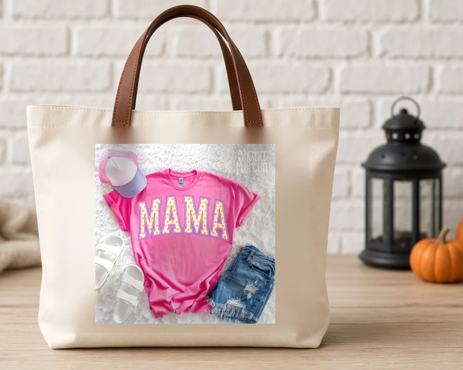Pink Varsity Mama PNG design on a canvas tote bag