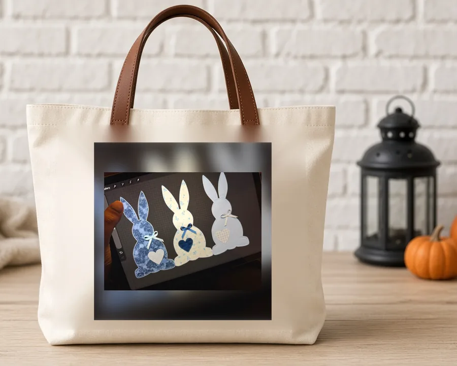 Quilted Easter Bunnies PNG design on a canvas tote bag