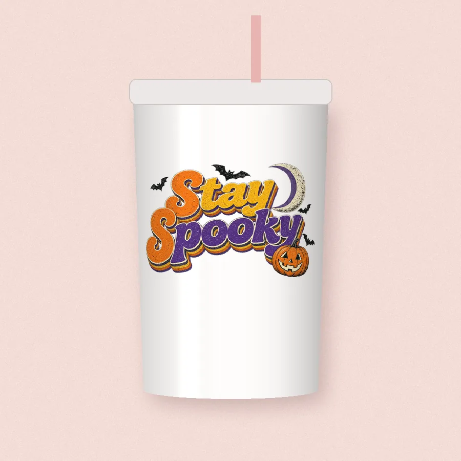 Stay Spooky Retro sublimation design on a skinny tumbler