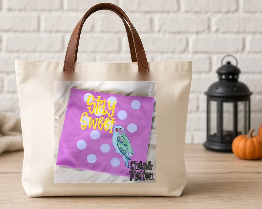 Stay Sweet Parrot PNG design on a canvas tote bag