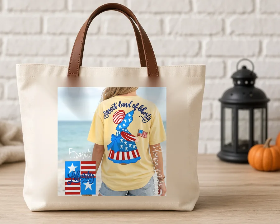Sweet Land of Liberty PNG design on a canvas tote bag