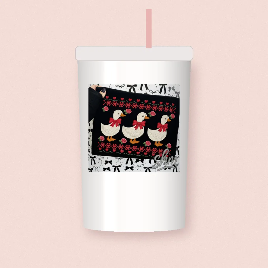 Valentine Geese and Roses sublimation design on a skinny tumbler